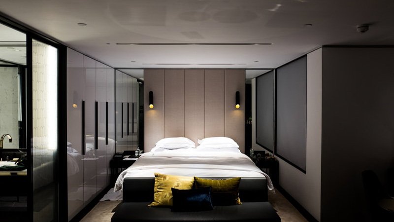 bed with white bed sheet and pillowcase set.jpg